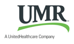 Professional team of six standing in front of Horvath Vision Care sign.