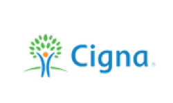 Professional team of six standing in front of Horvath Vision Care sign.