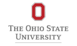 Professional team of six standing in front of Horvath Vision Care sign.