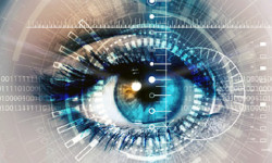 Professional team of six standing in front of Horvath Vision Care sign.