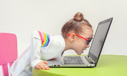 Professional team of six standing in front of Horvath Vision Care sign.