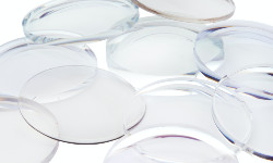Close-up of clear contact lenses arranged together.