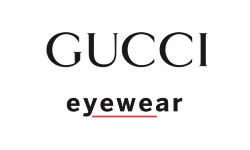 Professional team of six standing in front of Horvath Vision Care sign.